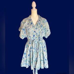 50s/ vintage vibe baby blue floral babydoll dress with pockets and tie waist
